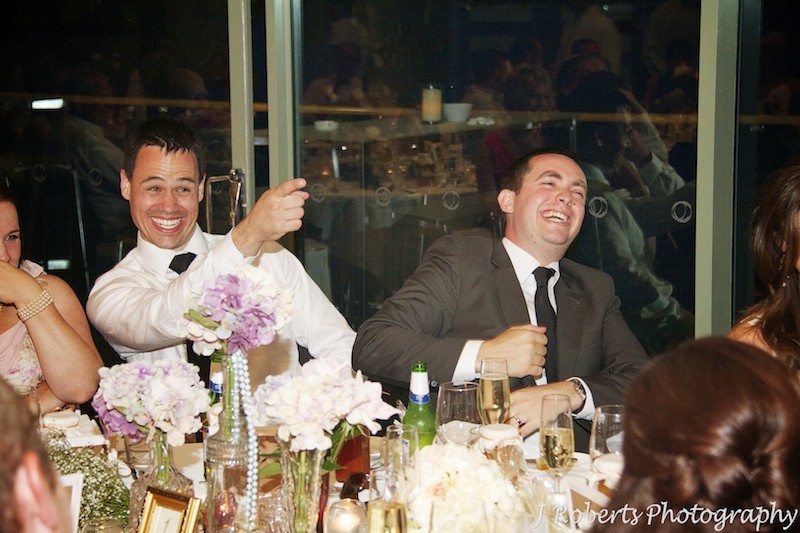 Groom and bestman laughing at wedding speeches - wedding photography sydney
